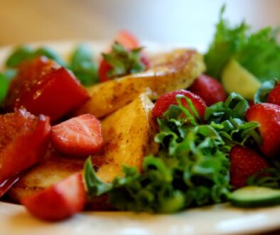 Cheese salad with roasted tomatoes and strawberries