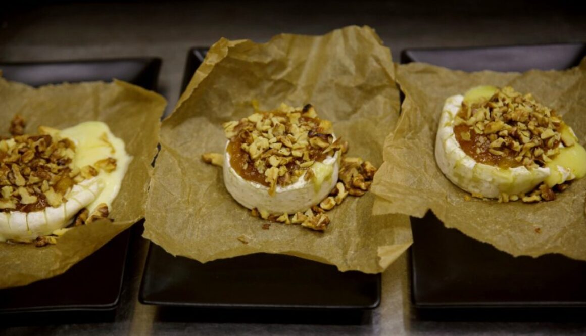 Brie cheese with pear honey and roasted walnuts