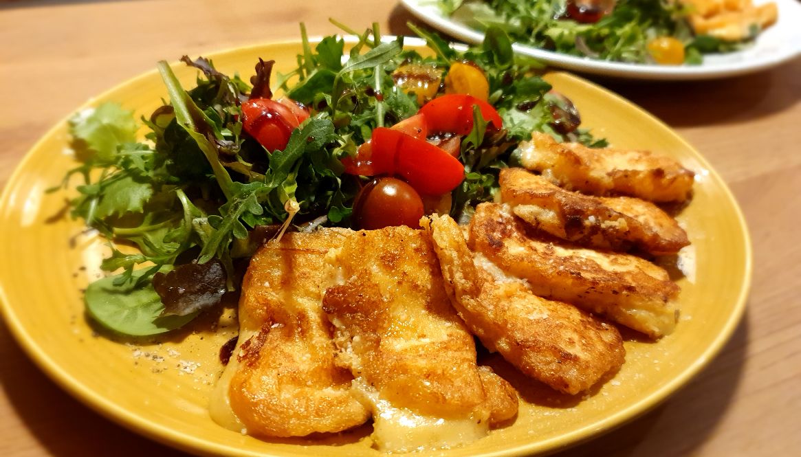 Breaded cheese with salad