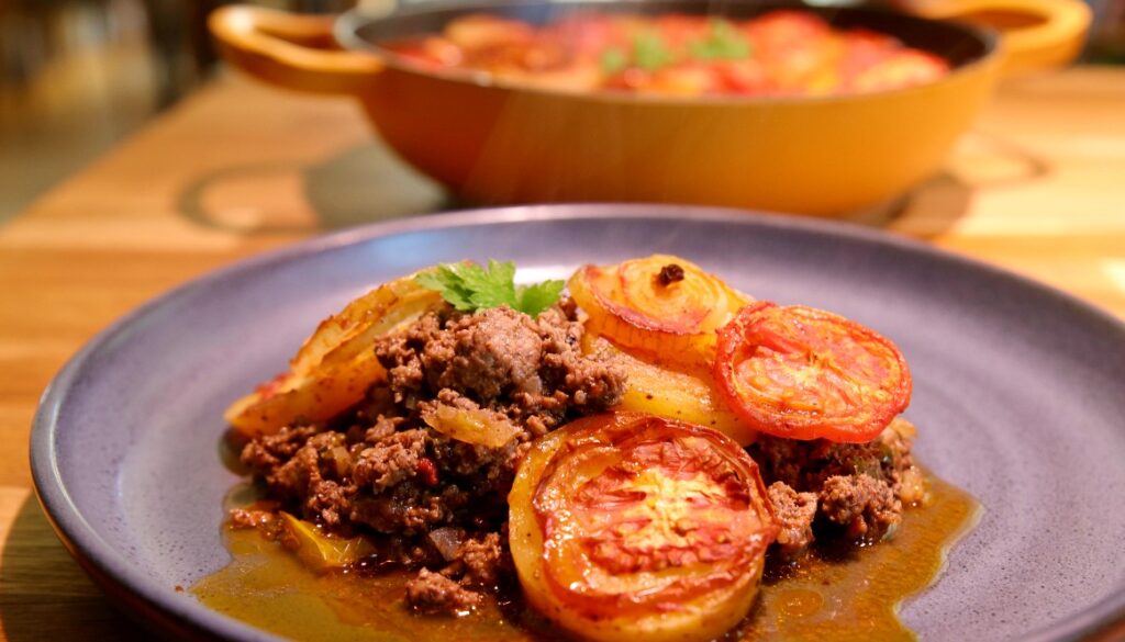 Casserole with Minced Beef, Potatoes, Tomatoes, and Onions