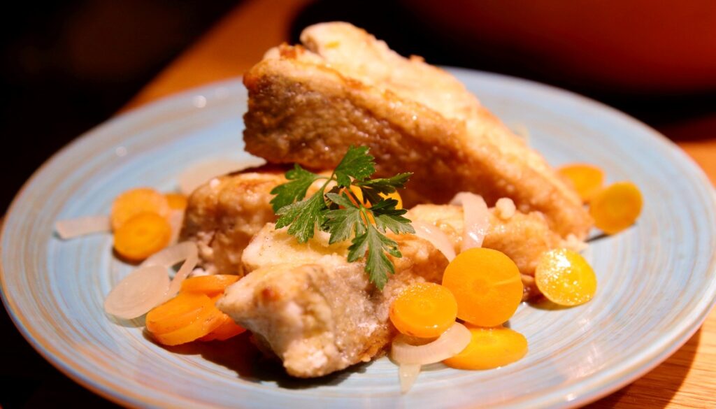 Breaded pike perch in vinegar marinade